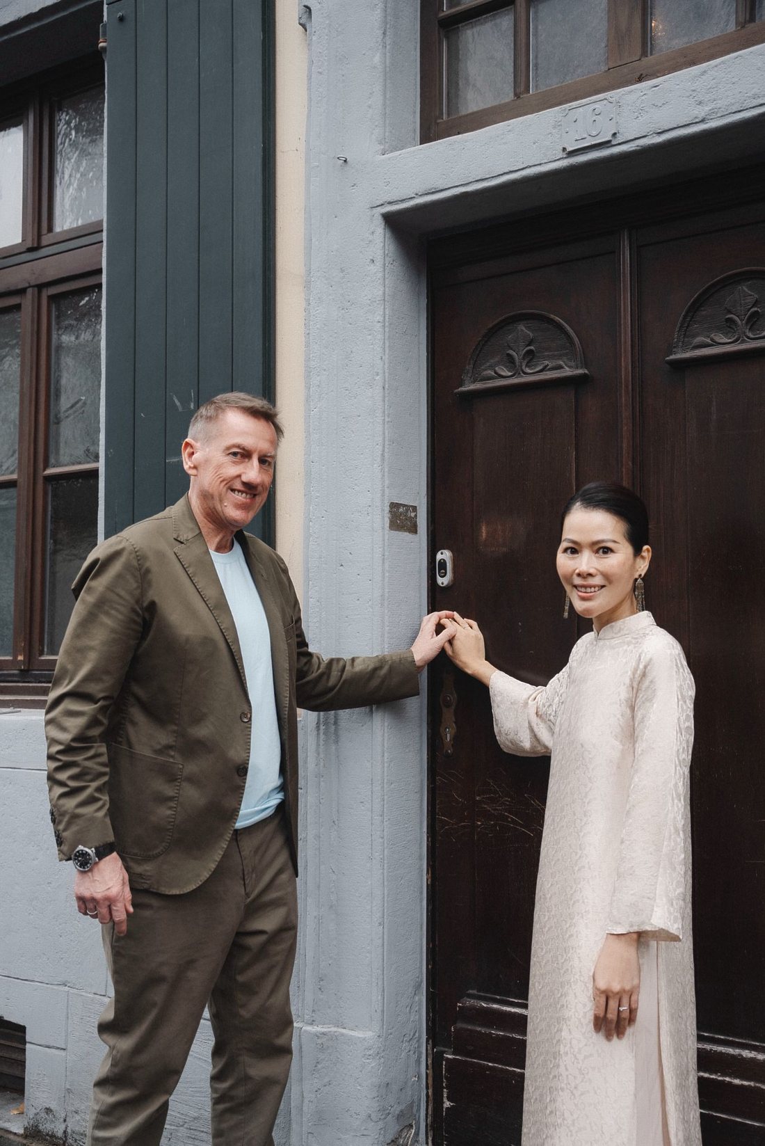 Quynh and Jörg C. Bünzel at the door of Haus Jordans, Neuss